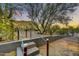 Landscaped backyard with steps and retaining wall, creating an inviting outdoor space at 6002 E Cholla Rd, Cave Creek, AZ 85331