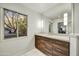 Bathroom with a window above the vanity allowing plenty of natural light at 6002 E Cholla Rd, Cave Creek, AZ 85331