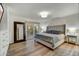 Bedroom with a large mirror and access to the back patio at 6002 E Cholla Rd, Cave Creek, AZ 85331