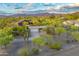Charming single story home featuring desert landscaping, attached garage, and stunning mountain views at 6002 E Cholla Rd, Cave Creek, AZ 85331
