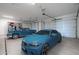 Spacious three-car garage with room for parking and storage at 6579 W Apex Ave, Queen Creek, AZ 85144
