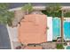 Overhead shot of roof, backyard, pool, patio, desert landscaping, and privacy fence at 6901 W Tonto Dr, Glendale, AZ 85308