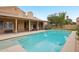 Inviting backyard pool with patio and seating, perfect for outdoor relaxation and entertaining at 6901 W Tonto Dr, Glendale, AZ 85308