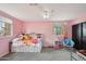Bedroom with a large bed and plenty of natural light at 6901 W Tonto Dr, Glendale, AZ 85308