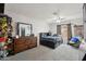 Bedroom with large bed and ceiling fan at 6901 W Tonto Dr, Glendale, AZ 85308