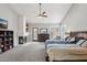 The main bedroom is spacious with a fireplace and private access to the pool and backyard at 6901 W Tonto Dr, Glendale, AZ 85308