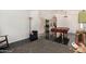 Spacious living room with tile floors and space for a pool table and entertaining at 7344 E Lindner Cir, Mesa, AZ 85209