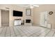 Cozy living room with fireplace, tile flooring, and a ceiling fan at 7344 E Lindner Cir, Mesa, AZ 85209