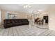 Open living and dining area featuring tile floors, a ceiling fan, and a connected kitchen at 7344 E Lindner Cir, Mesa, AZ 85209