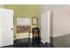 Bright office with a white board, a desk and access to the rest of the home at 7344 E Lindner Cir, Mesa, AZ 85209