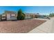 Charming single-story home with mature landscaping and a covered porch, offering curb appeal at 7345 W Beryl Ave, Peoria, AZ 85345
