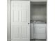 This laundry closet features a side-by-side washer and dryer at 7345 W Beryl Ave, Peoria, AZ 85345