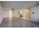 A basement with tile floor and stairwell leading to a different level of the house at 8329 E Keim Dr, Scottsdale, AZ 85250
