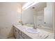 Well-lit bathroom features a double sink vanity and a shower-tub combo at 8329 E Keim Dr, Scottsdale, AZ 85250