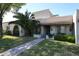 Charming single-story home with well-manicured front yard and mature palm tree at 8329 E Keim Dr, Scottsdale, AZ 85250