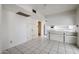 Spacious eat-in kitchen with white cabinets, ample counter space and tile flooring at 8329 E Keim Dr, Scottsdale, AZ 85250