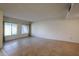 A bright living room featuring tiled floors, neutral walls, and plenty of natural light at 8329 E Keim Dr, Scottsdale, AZ 85250