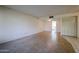 Open living room with tile flooring, neutral paint, and versatile space for decor at 8329 E Keim Dr, Scottsdale, AZ 85250