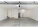 Spacious garage with epoxy flooring, offering ample storage and parking at 9009 E Sahuaro Dr, Scottsdale, AZ 85260