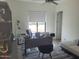 Office features a spacious desk, modern decor, and comfortable seating, creating an ideal workspace at 10694 E Firethorn Dr, Scottsdale, AZ 85255