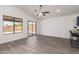 Bright living room features lots of natural light, access to backyard and breakfast bar at 11004 E Delta Ave, Mesa, AZ 85208