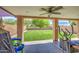 Inviting backyard with lush green lawn, covered patio, and plenty of space for outdoor activities at 11301 W Glenrosa Ave, Phoenix, AZ 85037