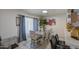 Bright dining area featuring a modern table, stylish chairs, and decorative accents at 11301 W Glenrosa Ave, Phoenix, AZ 85037