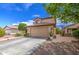 Charming two-story home with a well-manicured lawn and desert landscaping at 11301 W Glenrosa Ave, Phoenix, AZ 85037
