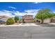 Inviting two-story home with a desert-style front yard and covered entry at 11301 W Glenrosa Ave, Phoenix, AZ 85037