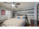 The main bedroom features an ensuite bathroom and a fan at 11301 W Glenrosa Ave, Phoenix, AZ 85037