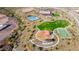 Aerial shot featuring the community pool, playground, clubhouse, and sport courts at 13384 W Red Range Way, Peoria, AZ 85383