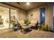 Cozy outdoor patio with comfortable seating, perfect for relaxation and enjoying the serene surroundings at 13384 W Red Range Way, Peoria, AZ 85383