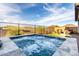 Stunning pool featuring a stone surround and views at 13384 W Red Range Way, Peoria, AZ 85383