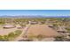 Wide aerial shot of both equestrian arenas at 14118 E Rancho Del Oro Ct, Scottsdale, AZ 85262