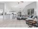 Open-concept floorplan showcasing a living room and kitchen space with vaulted ceilings and natural light at 1508 S Danyell Pl, Chandler, AZ 85286