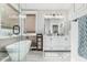 Bright main bath features a soaking tub, glass shower, and a double sink vanity at 1508 S Danyell Pl, Chandler, AZ 85286
