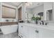Beautiful main bathroom featuring double sinks, a soaking tub, and modern finishes at 1508 S Danyell Pl, Chandler, AZ 85286
