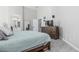 The spacious main bedroom features an ensuite bath, walk in closet, and wood-look tile floors at 1508 S Danyell Pl, Chandler, AZ 85286