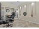 Bright office featuring large work desk, decorative shelving, and modern chair at 1588 E Sweet Citrus Dr, Queen Creek, AZ 85140