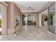 Cozy patio featuring a fireplace, seamlessly connects to the indoor living space at 1588 E Sweet Citrus Dr, Queen Creek, AZ 85140