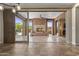 Spacious patio with fireplace and tile flooring, perfect for outdoor living at 1588 E Sweet Citrus Dr, Queen Creek, AZ 85140