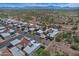 This aerial view showcases the community's tiled roofs against the desert landscape at 17289 E Kirk Ln, Fountain Hills, AZ 85268