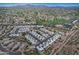 Expansive aerial view of the community, highlighting the nearby golf course and desert at 17289 E Kirk Ln, Fountain Hills, AZ 85268