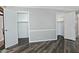 Bedroom featuring wood-look flooring and multiple doorways offering space and natural light at 17289 E Kirk Ln, Fountain Hills, AZ 85268