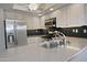Kitchen with granite counters, stainless appliances, and white cabinetry at 17289 E Kirk Ln, Fountain Hills, AZ 85268