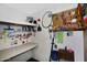 Workshop area with pegboard and shelves for organization and storage at 17289 E Kirk Ln, Fountain Hills, AZ 85268