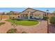 Expansive backyard showcasing a barbecue grill, seating, and manicured artificial turf at 17514 W Desert Sage Dr, Goodyear, AZ 85338