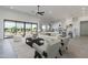 Inviting living room with an open floor plan, large windows, and modern decor at 1845 N 103Rd St, Mesa, AZ 85207