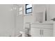 Modern bathroom with a glass-enclosed shower, featuring a clean and contemporary design for a spa-like experience at 20332 W Sells Dr, Buckeye, AZ 85396