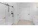 Modern bathroom with a glass-enclosed shower and sleek fixtures, creating a bright and clean space at 20332 W Sells Dr, Buckeye, AZ 85396